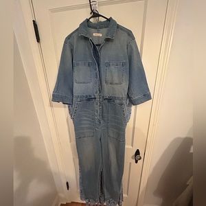 Romper gently used with lots of love left in her.